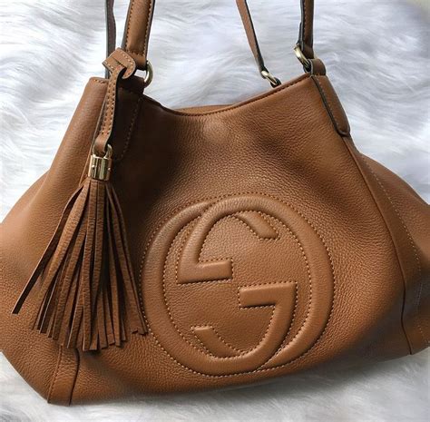 bolsa gucci caramelo|Gucci leather shoulder bag.